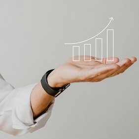 digital-increasing-bar-graph-with-businessman-hand-overlay_small.jpg